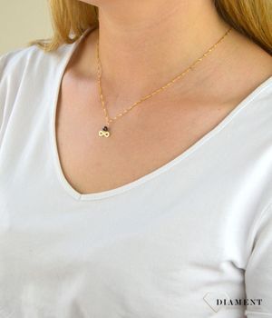 Złota zawieszka 585 nieskończoność z czarną cyrkonią ZA 4751 to klasyczny element biżuterii mogącej pięknie ozdobić każdy kobiecy dekolt. To dodatek, który nie tylko  (1).JPG